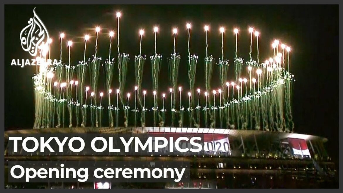 Pandemic-hit Tokyo Olympics open in low-key ceremony without fans