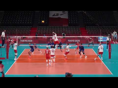 Wilfredo Leon spikes at Tokyo 2020 Olympics