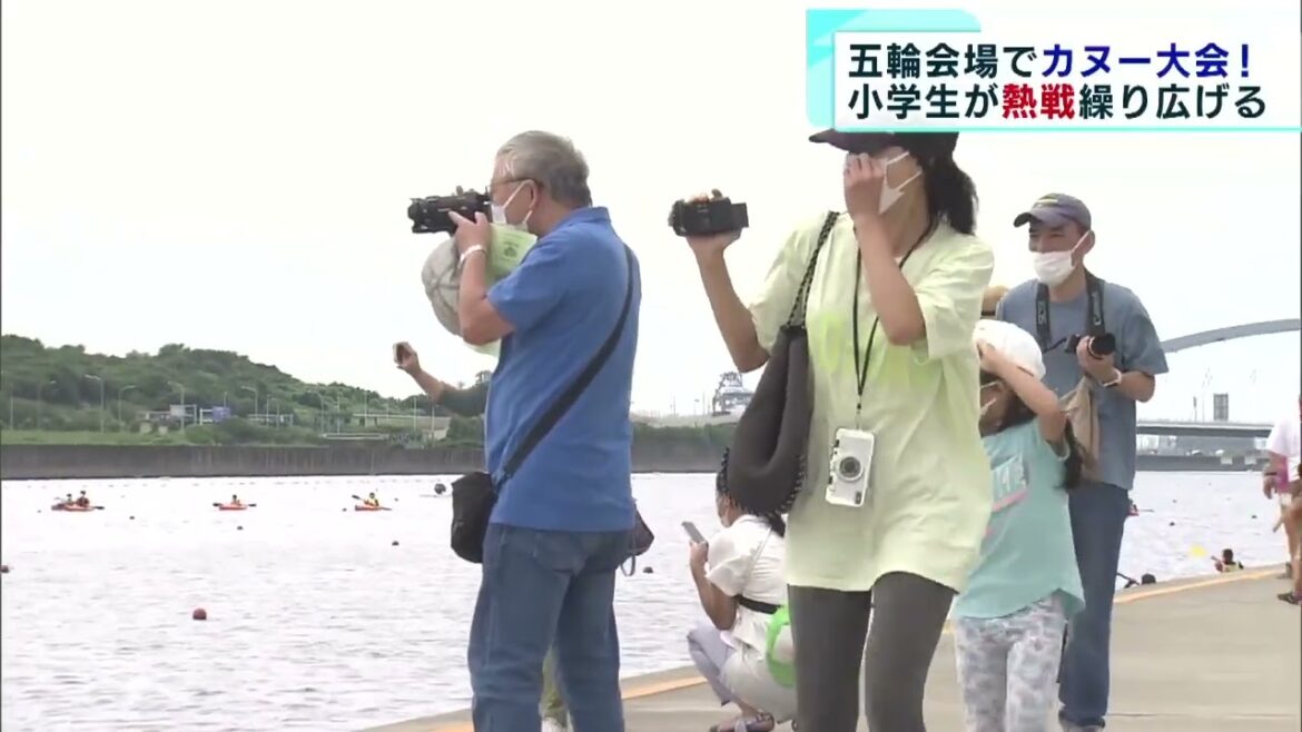 Children compete fiercely at the Olympic stadium Canoe competition held in Koto Ward