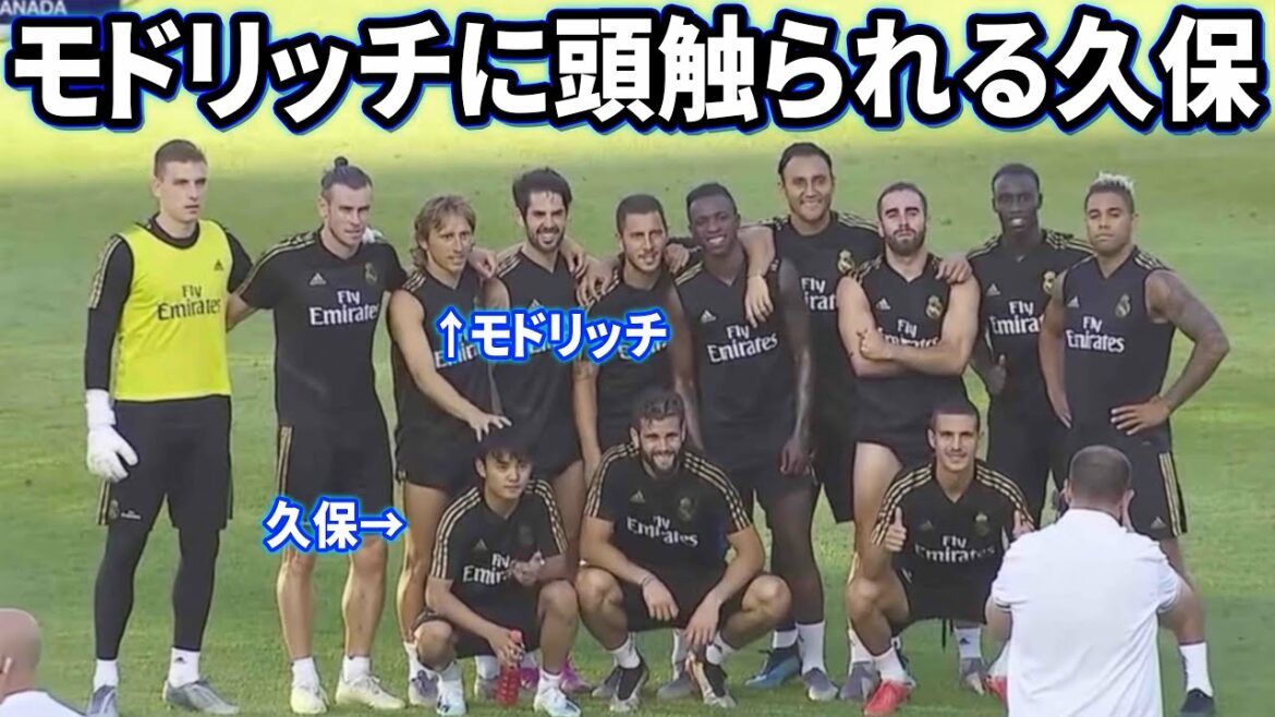 Takefusa Kubo gets his head touched by Modric