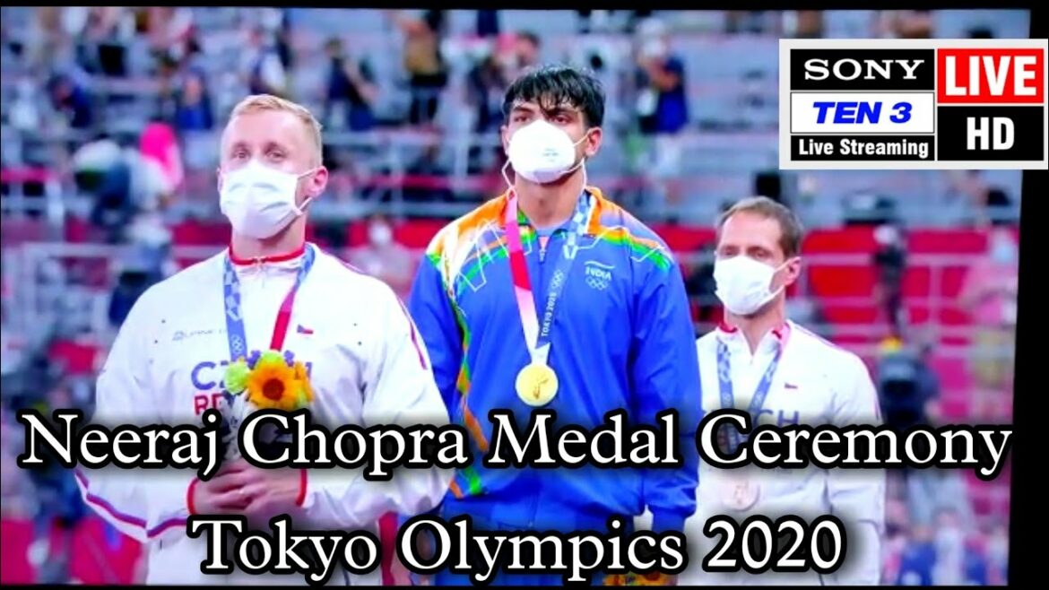 Neeraj Chopra Javelin Throw Gold Medal in Tokyo Olympics 2020 Medal Ceremony Olympic Podium by IOC Neeraj Chopra Javelin Throw Gold Medal in Tokyo Olympics 2020 Medal Ceremony Olympic Podium by IOC