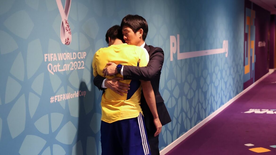 Director Moriyasu hugging Mitoma