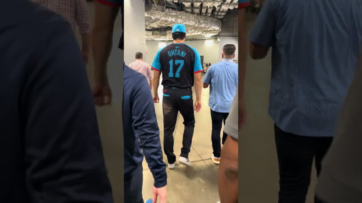 Escorting Shohei Ohtani to the press conference after the All-Star Game in Texas