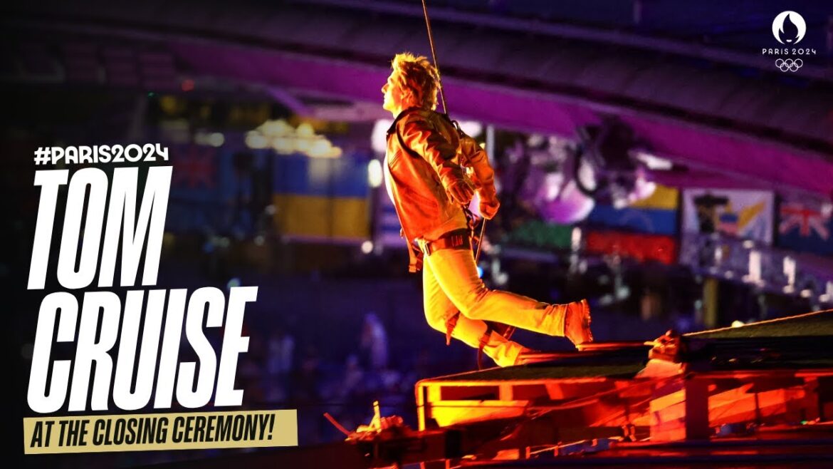 Tom Cruise abseils from the stadium roof, and rides off on a motorbike! | #Paris2024 Tom Cruise abseils from the stadium roof, and rides off on a motorbike! | #Paris2024