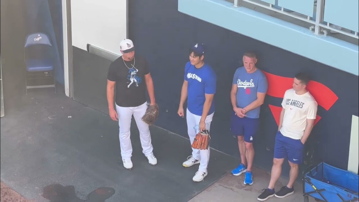 Shohei Ohtani throwing and Yoshinobu Yamamoto in the bullpen.