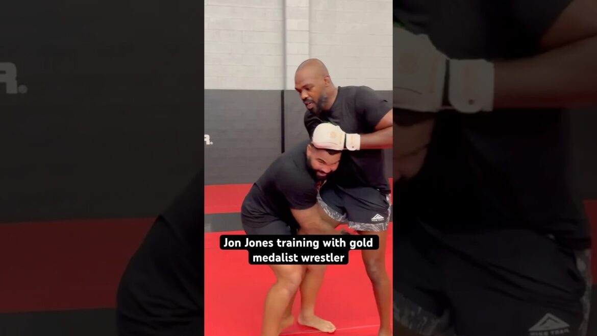 Jon Jones lands knee on Olympic gold medalist wrestler, Gable Steveson.