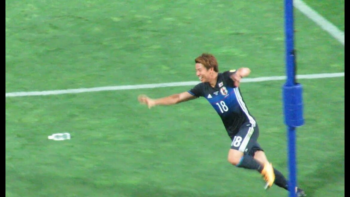 Japan's soccer team player Asano Takuma scores the first goal of the Russia World Cup. Asia final qualifying against Australia