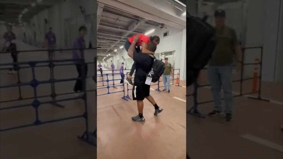 Melissa Jefferson-Wooden hugs husband after 4×100 win in Tokyo Melissa Jefferson-Wooden hugs husband after 4x100 win in Tokyo