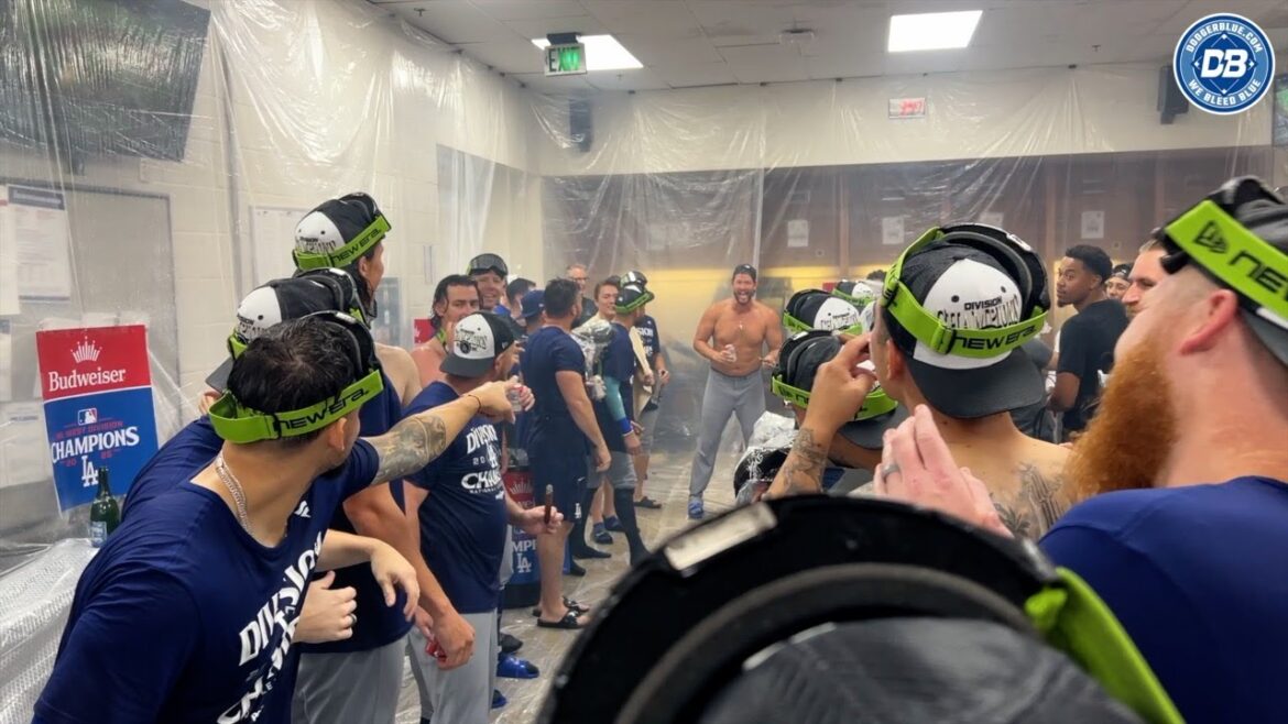 Shohei Ohtani's interpreter Will Ireton & Dodgers trainers on Slip 'N Slide for NL West celebration