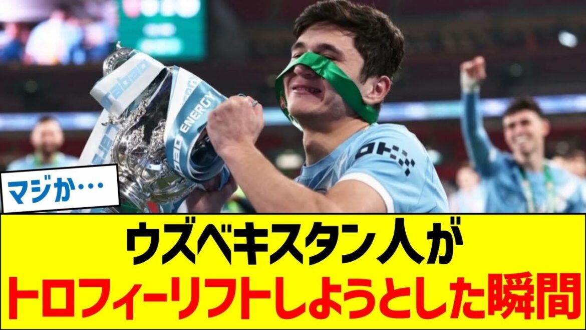 The moment when the Uzbek man tried to lift the trophy.