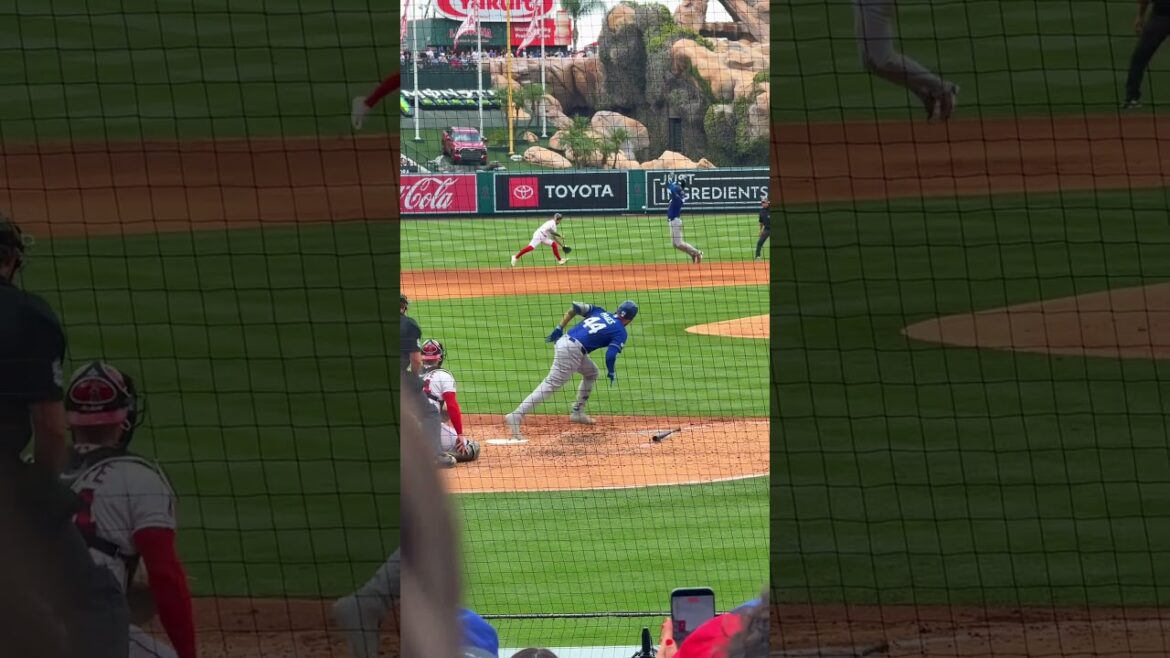 Shohei Ohtani jumps out of the way of a line drive during the Angels and Dodgers Freeway Series.